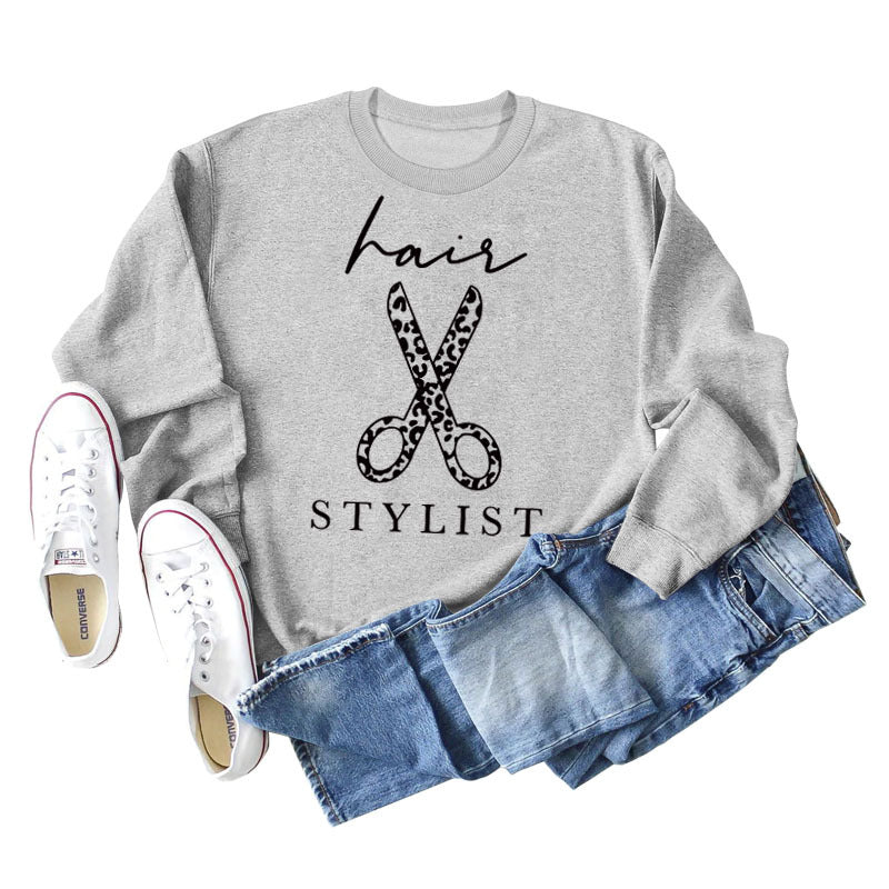 Sweatshirt mit Rundhalsausschnitt und langen Ärmeln für Friseurscheren mit Buchstabendruck