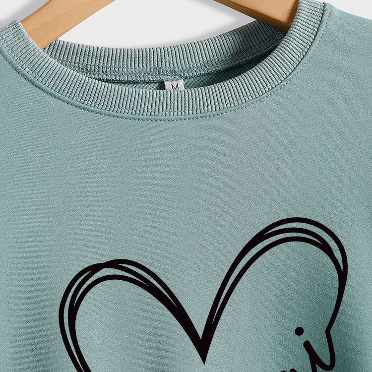 Gigi Heart Letter Printed Rundhalspullover mit lockerem Schnitt und langen Ärmeln