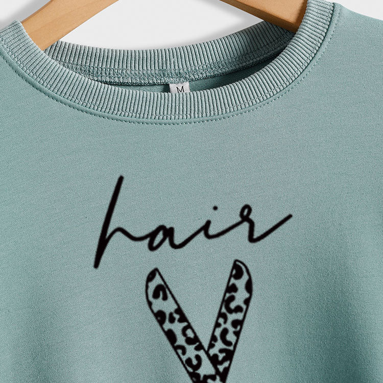 Sweatshirt mit Rundhalsausschnitt und langen Ärmeln für Friseurscheren mit Buchstabendruck