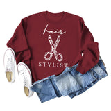 Sweatshirt mit Rundhalsausschnitt und langen Ärmeln für Friseurscheren mit Buchstabendruck