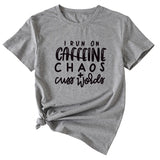 I Run on Caffeine Chaos&#039;s Short Sleeve T-shirt Printed in Black and White Letters.