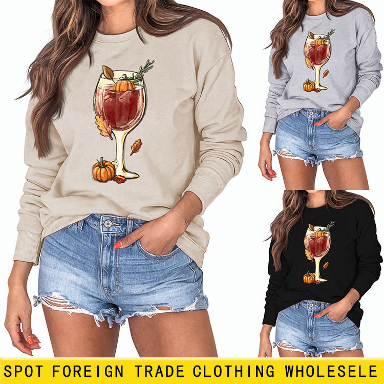 Pull ample à manches longues imprimé citrouille en verre de vin rouge