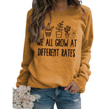 Damen Pullover mit Rundhalsausschnitt, Buchstaben-Motiv, langärmelig, „WE ALL GROW“-Aufdruck, lockerer Schnitt