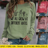 Damen Pullover mit Rundhalsausschnitt, Buchstaben-Motiv, langärmelig, „WE ALL GROW“-Aufdruck, lockerer Schnitt