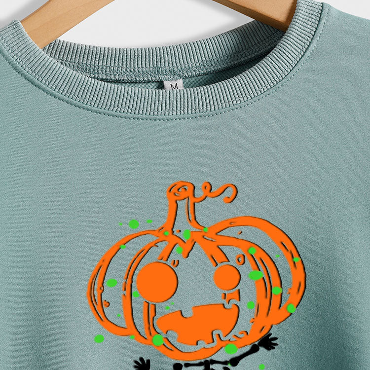 Pull à manches longues et col rond imprimé crâne de citrouille pour femme