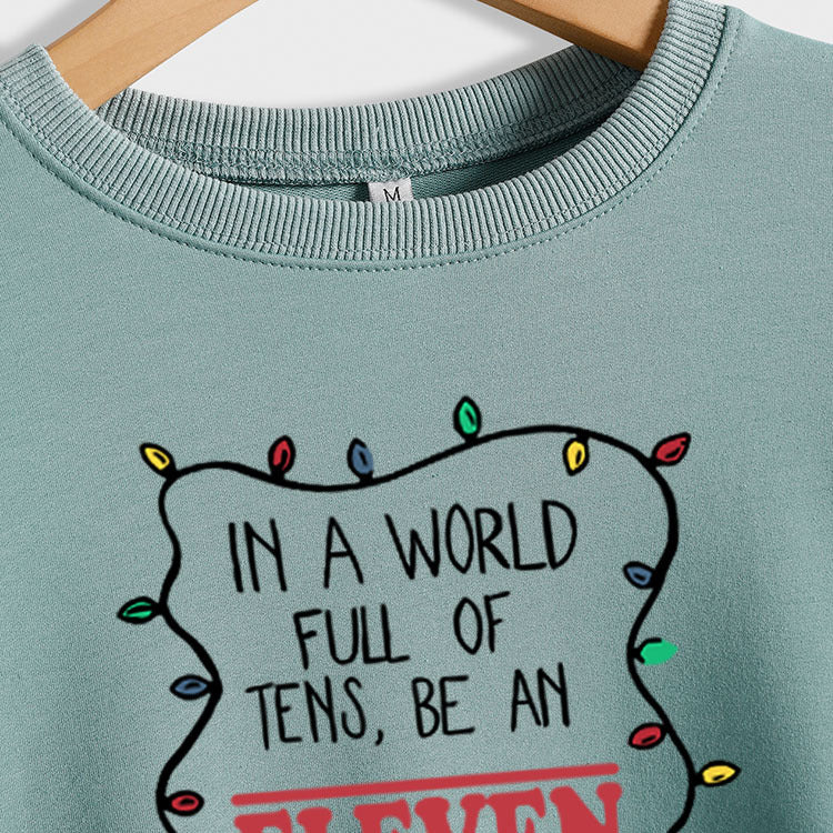 IN A WORLD SWEAT-SHIRT À MANCHES LONGUES À FOND AMBRE FEMME